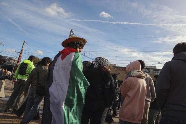 Brussels Belgium Education Protest A demonstrator draped in a Palestinian flag walks among protesters in Brussels, Belgium on October 24, 2026. Hundreds of mainly young protesters gathered in Brussels to demand more funding for education and public services. Demonstrators further criticized police conduct, accusing officers of excessive force during previous rallies. Brussels Brussels Capital Belgium Copyright: xMohammedxHamadax