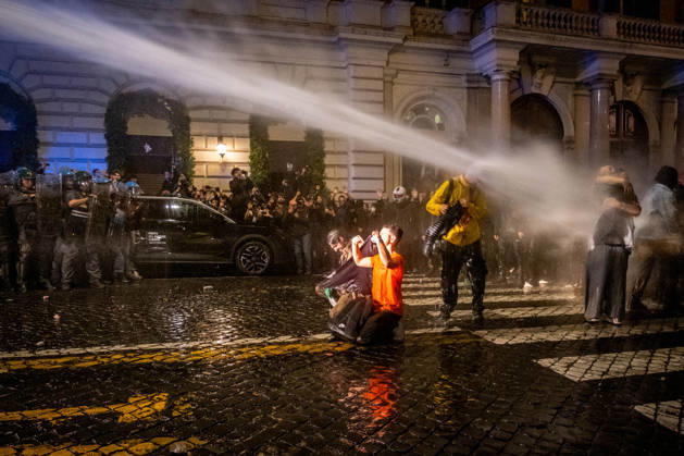 October 24, 2026, Rome, Rm, Italy: Thousands of people take to the streets to join the Get Italy out of the war march. Participants are calling for peace and protesting against the rising cost of living. TThe police use water cannons to block the way for participants attempting to continue their march outside the agreed-upon route. Rome Italy - ZUMAg256 20261024_znp_g256_040 Copyright: xMarcoxDixGianvitox