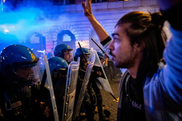 October 24, 2026, Rome, Rm, Italy: Thousands of people take to the streets to join the Get Italy out of the war march. Participants are calling for peace and protesting against the rising cost of living. The police block the way for participants attempting to continue their march outside the agreed-upon route. Rome Italy - ZUMAg256 20261024_znp_g256_027 Copyright: xMarcoxDixGianvitox