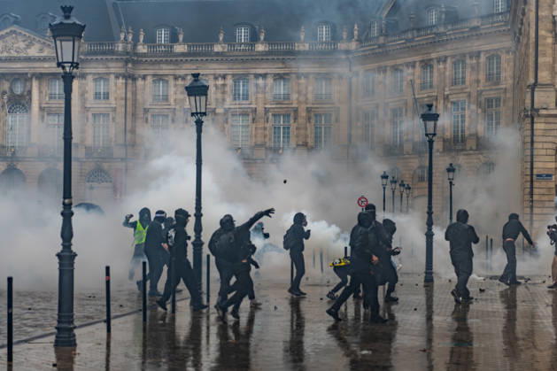October 24, 2026, Bordeaux, Nouvelle-Aquitaine, France: In Bordeaux, the march on the second day of protests against the rising cost of living initially proceeded peacefully. At the end of the route, violent clashes broke out on the sidelines between groups of demonstrators and law enforcement officers. Projectiles were thrown at riot police, who used tear gas to disperse the groups. Participants in the mobilization also included members of the Yellow Vests movement. Bordeaux France - ZUMAh207 20261024_zip_h207_023 Copyright: xFabricexHebertx