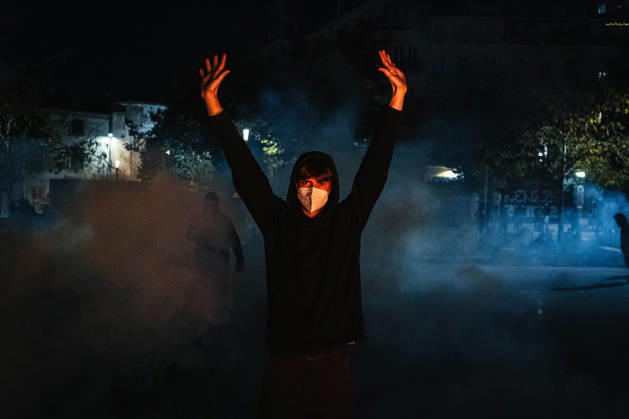 Marseille France Street Protests A demonstrator raises both hands amid smoke during a protest in Marseille, France on October 24, 2026. Authorities deployed around 70,000 security personnel across France for renewed protests over the cost of living, after unrest a week earlier saw public buildings damaged, hundreds of shops looted and about 2,700 people arrested. Marseille Provence-Alpes-CÃ te France Copyright: xNaelxChahinex
