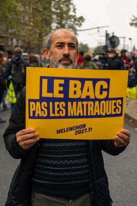 Yellow Vests Protest Act II - Paris Demonstrators carry placards displaying political messages during a march against the rising cost of living and for social justice in Paris, France, on October 24, 2026. The protest follows the boulevards des Maréchaux from Porte d’Italie to Porte de Vincennes, with calls for higher wages and better funding for public services and education. Photo by Jules Bernard ABACAPRESS.COM Paris Île-de-France France  Copyright: xBernardxJules ABACAx