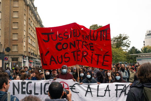 Yellow Vests Protest Act II - Paris Demonstrators carry placards displaying political messages during a march against the rising cost of living and for social justice in Paris, France, on October 24, 2026. The protest follows the boulevards des Maréchaux from Porte d’Italie to Porte de Vincennes, with calls for higher wages and better funding for public services and education. Photo by Jules Bernard ABACAPRESS.COM Paris Île-de-France France  Copyright: xBernardxJules ABACAx