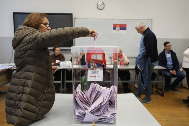 Serbia Parliamentary Election Voters cast their ballots at a polling station during early parliamentary election at Fifth Belgrade Gymnasium in Blegrade, Serbia on October 25, 2026. 6.45 million registered voters are eligible to elect the 250 members of the National Assembly amid a political crisis and ongoing student-led protests demanding greater accountability and action against corruption.  Stringer PIXSELL