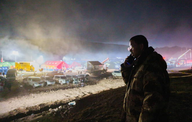 (261025) -- BAQEN, Oct. 25, 2026 -- Du Guoping calls his family at a temporary shelter in Maru Township of Baqen County, Nagqu City, southwest China s Xizang Autonomous Region, Oct. 24, 2026. After a 7.0-magnitude earthquake struck Baqen County in Nagqu, southwest China s Xizang Autonomous Region, on Thursday, Du Guoping, owner of a dumpling restaurant in Xigaze, postponed the opening of his two new restaurants and headed to the disaster zone with his staff. It took only about 10 minutes to make the decision that we would go to Baqen and cook dumplings for earthquake-affected residents, Du said. The team loaded more than 1,500 kilograms of dumplings onto vehicles and set off from Xigaze at midnight on the night of the earthquake.