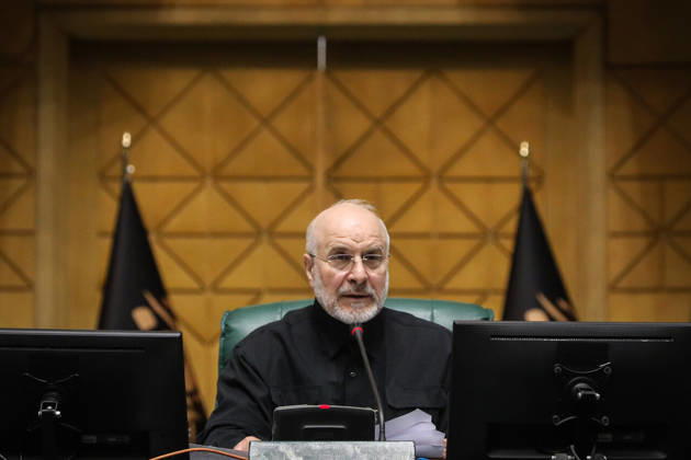 October 25, 2026, Tehran, Iran: Mohammad Bagher Ghalibaf holds a sheet of paper while speaking from the speaker s chair behind two monitors at the Islamic Consultative Assembly in Tehran, Iran, on October 25, 2026. Speaker Mohammad Bagher Ghalibaf chaired the October 25 session, which combined physical attendance at the Islamic Consultative Assembly with participation by video link. Tehran Iran - ZUMAi98_ 20261025_zih_i98_087 Copyright: xIcanax