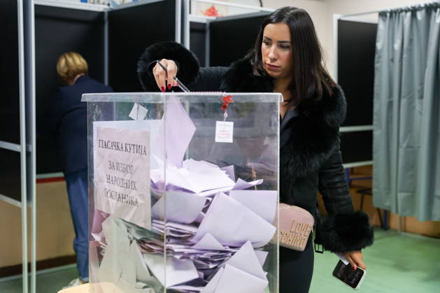 SERBIA, BELGRADE - OCTOBER 25, 2026: A woman casts her ballot at a polling station during the 2026 Serbian parliamentary election. On 25 October, the Serbs went to the polls to elect members of the country s unicameral parliament, Narodna Skupshtina. Alexander Ryumin TASS  99953847