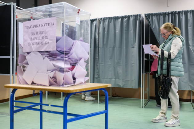 SERBIA, BELGRADE - OCTOBER 25, 2026: A woman casts her ballot at a polling station during the 2026 Serbian parliamentary election. On 25 October, the Serbs went to the polls to elect members of the country s unicameral parliament, Narodna Skupshtina. Alexander Ryumin TASS  99953850