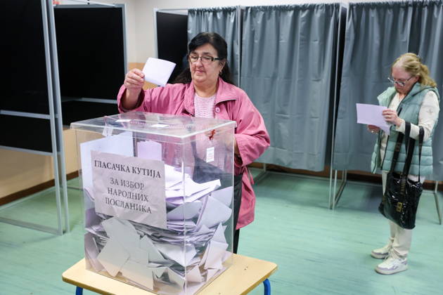 SERBIA, BELGRADE - OCTOBER 25, 2026: A woman casts her ballot at a polling station during the 2026 Serbian parliamentary election. On 25 October, the Serbs went to the polls to elect members of the country s unicameral parliament, Narodna Skupshtina. Alexander Ryumin TASS  99953855